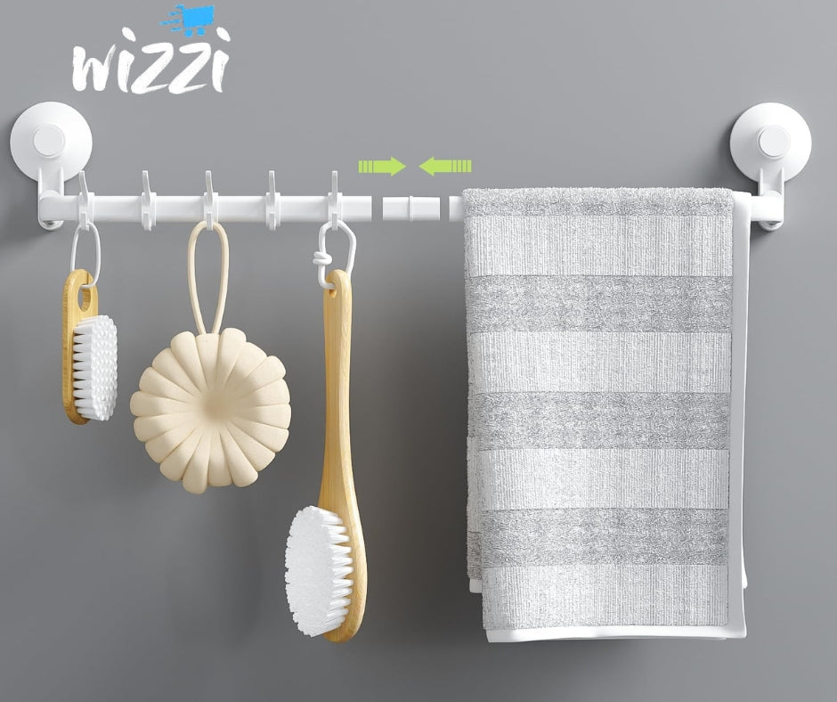 Barre porte-serviettes à ventouse blanche fixée sur un carrelage de salle de bain